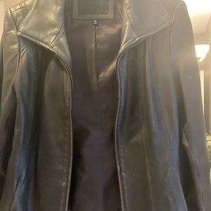Woman’s size L black leather jacket